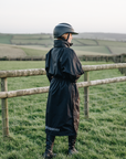 EQUIDRY Black Equimac Long waterproof riding coat lightweight raincoat worn by young horse rider