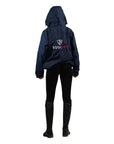 Shortie Child's Oversized Short Waterproof blouson style Riding Jacket Thin Fleece Lining Stowaway Hood in navy/raspberry back studio