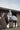 EQUIDRY women's long waterproof horse riding coat in charcoal/pale pink girl on horse with matching exercise sheet