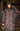 EQUIDRY women's thin fleece stowaway hood long waterproof horse riding coat in rich brown front view 