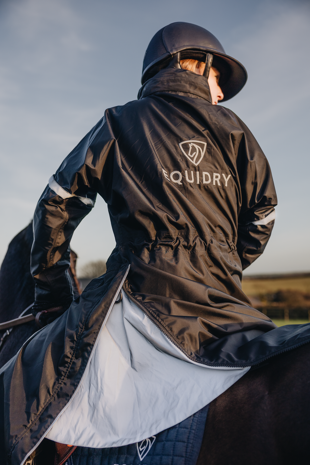 Evolution Children's | Thin Fleece | Stowaway Hood | Reflective | Black Forest Green - EQUIDRY waterproof riding coat on horse 