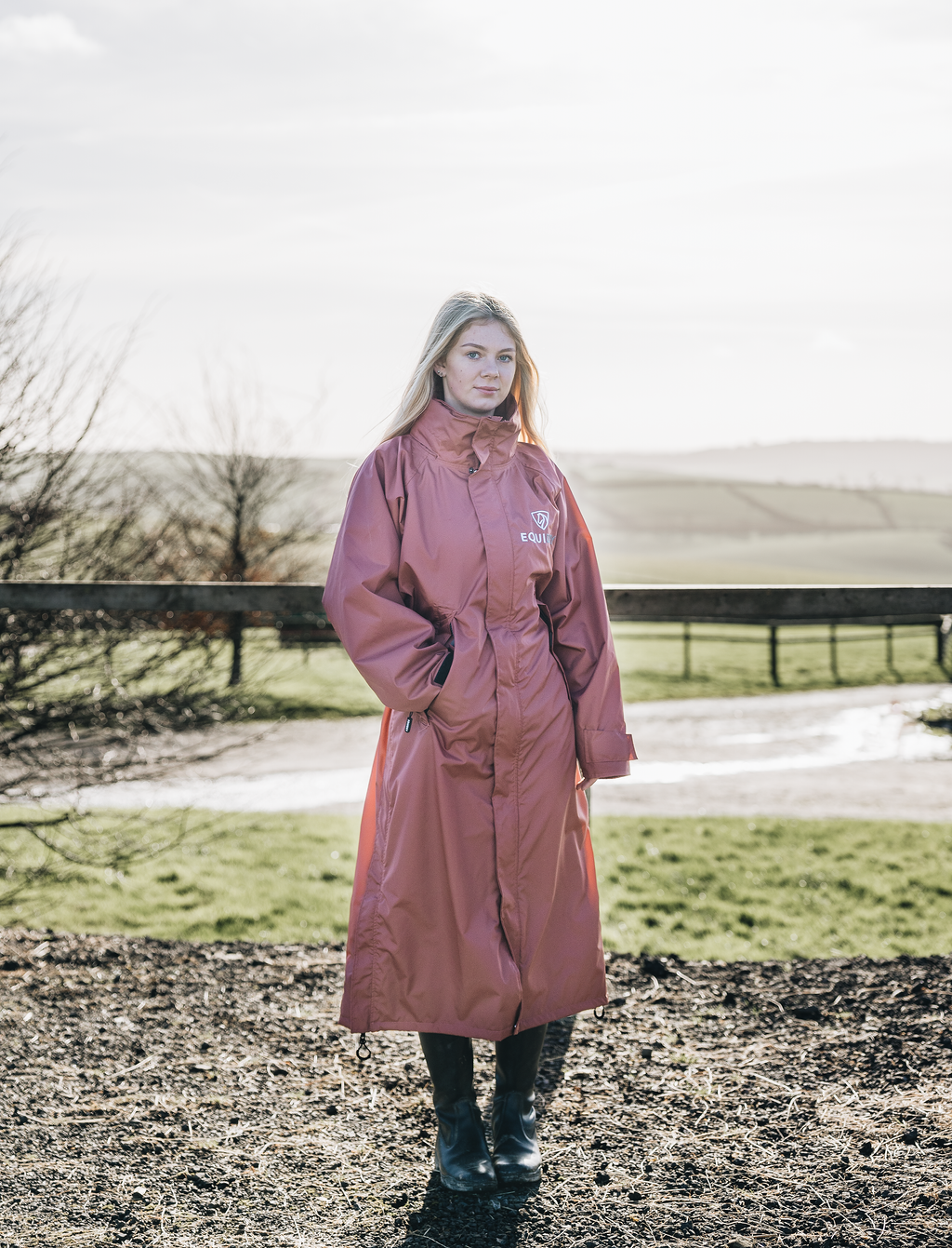 EQUIDRY chestnut Equimac long waterproof lightweight rain coat worn by horse rider 